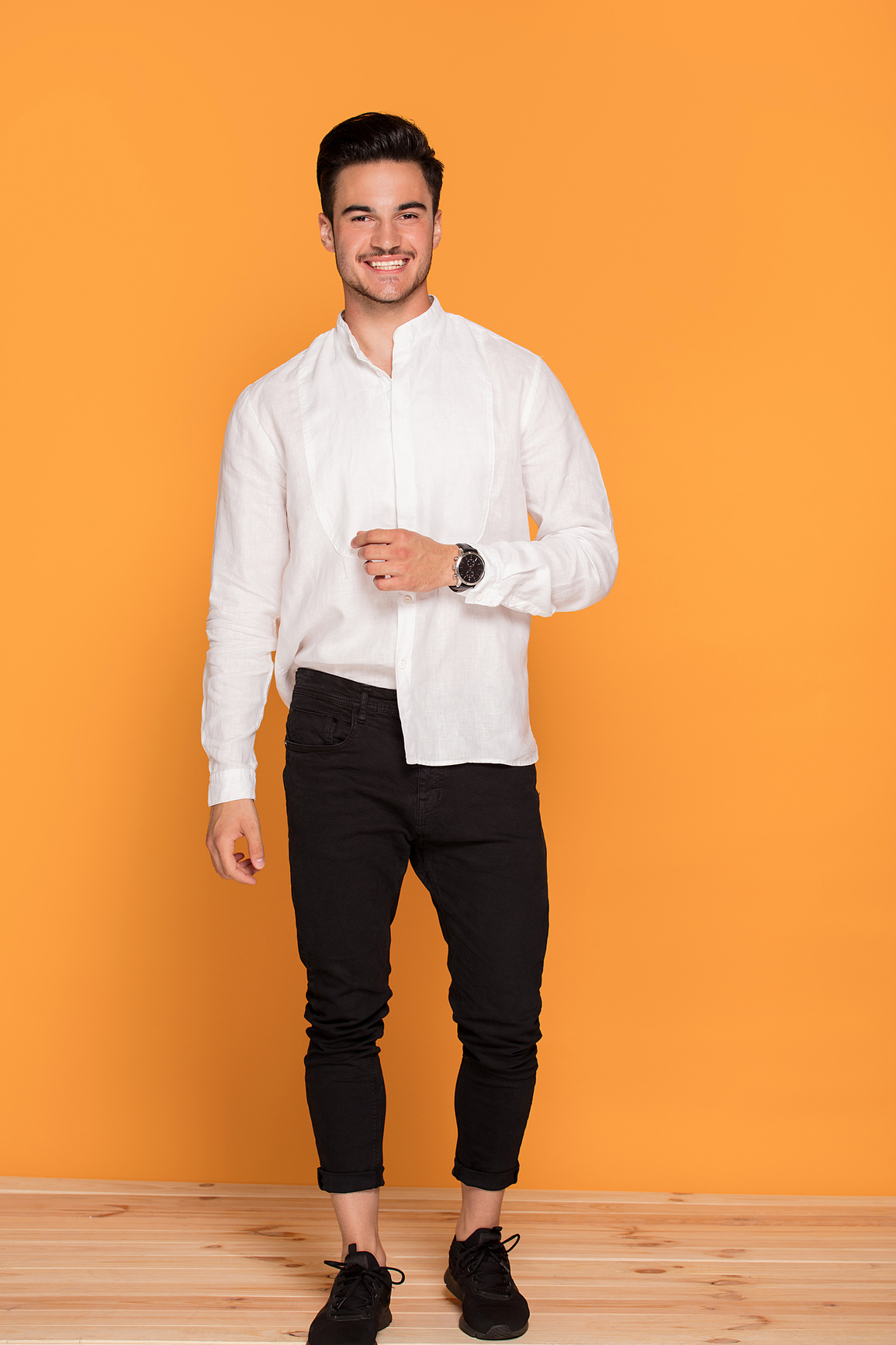Photo of elegant smiling handsome man.